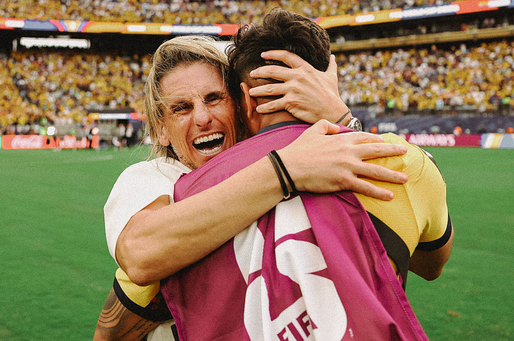 EAST RUTHERFORD, NEW JERSEY - JUNE 25: (EDITORS NOTE: This image has been digitally enhanced.) Sebastian Beccacece, Head Coach of Ecuador, celebrates with Piero Hincapie #3 after the 2-1 win during the FIFA World Cup 2026 Group E match between Ecuador and Germany at New York New Jersey Stadium on June 25, 2026 in East Rutherford, New Jersey. (Photo by Patrick Smith - FIFA/FIFA via Getty Images)
