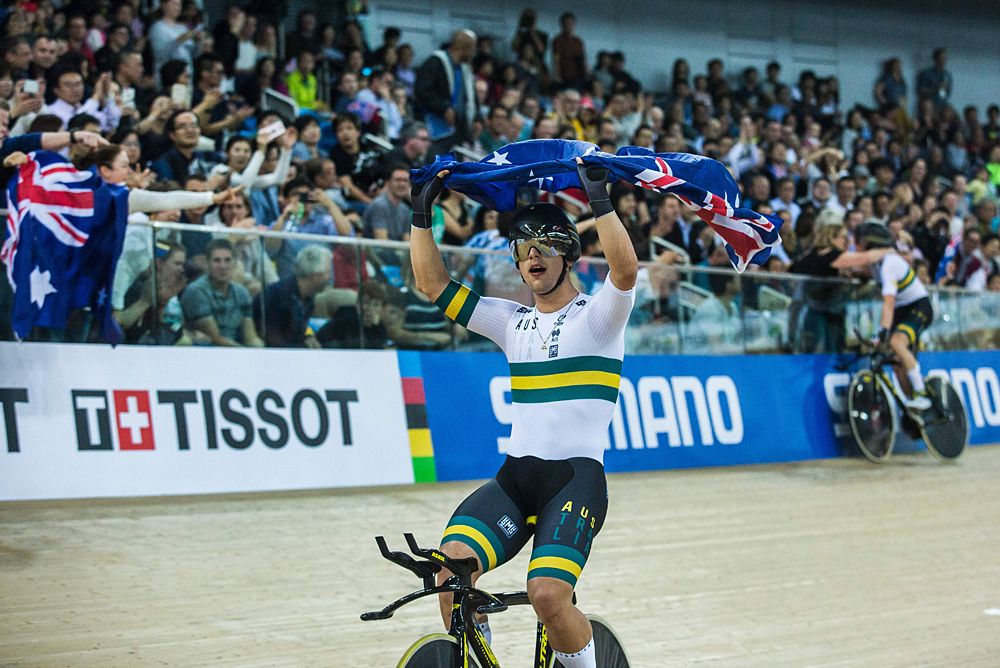 Sam Welsford celebrates Australia's team pursuit victory