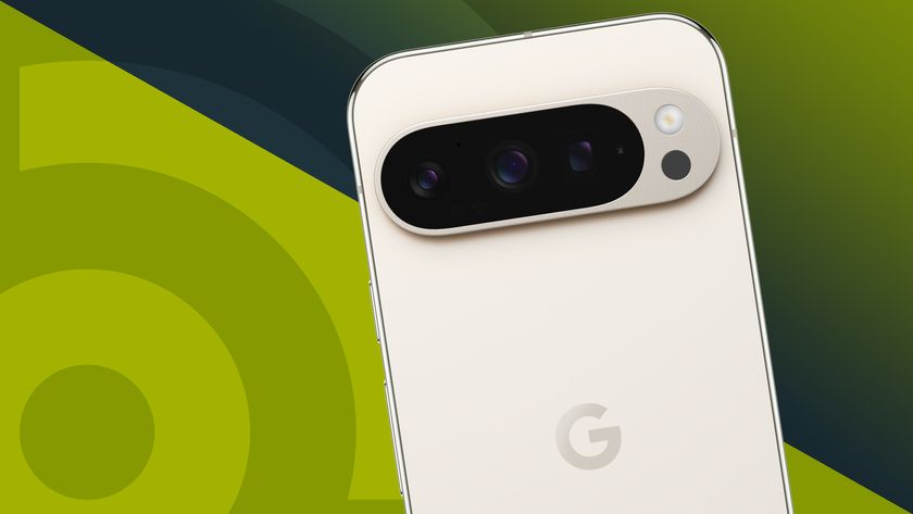 Google Pixel 9 Pro in Porcelain from the back showing the camera bar on top of a green and blue TechRadar logo banner
