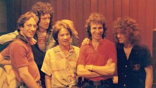 Brian May and Eddie Van Halen and other musicians in the studio