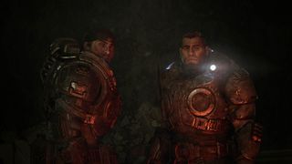 Marcus Fenix and Dom Santiago look up, covered in shadows, in the announcement trailer for Gears of War: E-Day