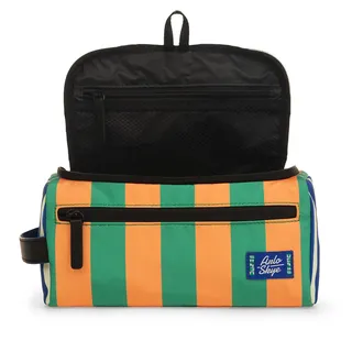 A travel dopp kit is captured open against a white blackground. It features green and orange stripes and a black interior linen.