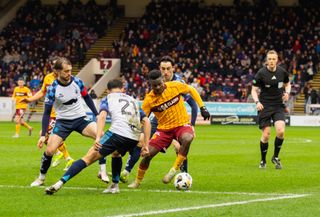"I spent a day shooting top-flight football with an entry-level mirrorless camera", student learns pro camera skills at Motherwell FC