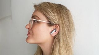 TechRadar freelance writer Becca wearing one of the Huawei Freebuds Pro 2 earbuds in her left ear