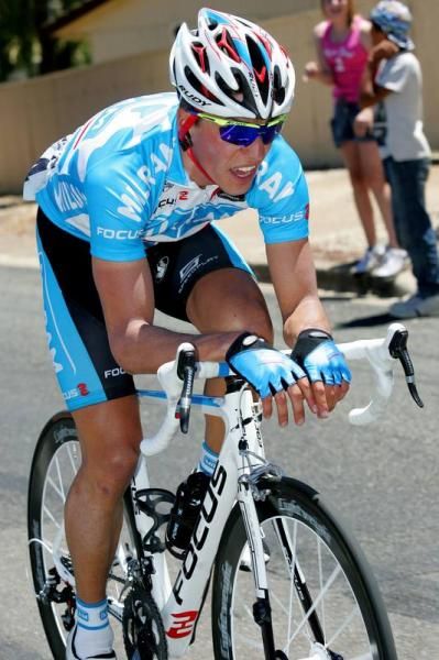 This Milram rider gets into the time trial position during stage oneA