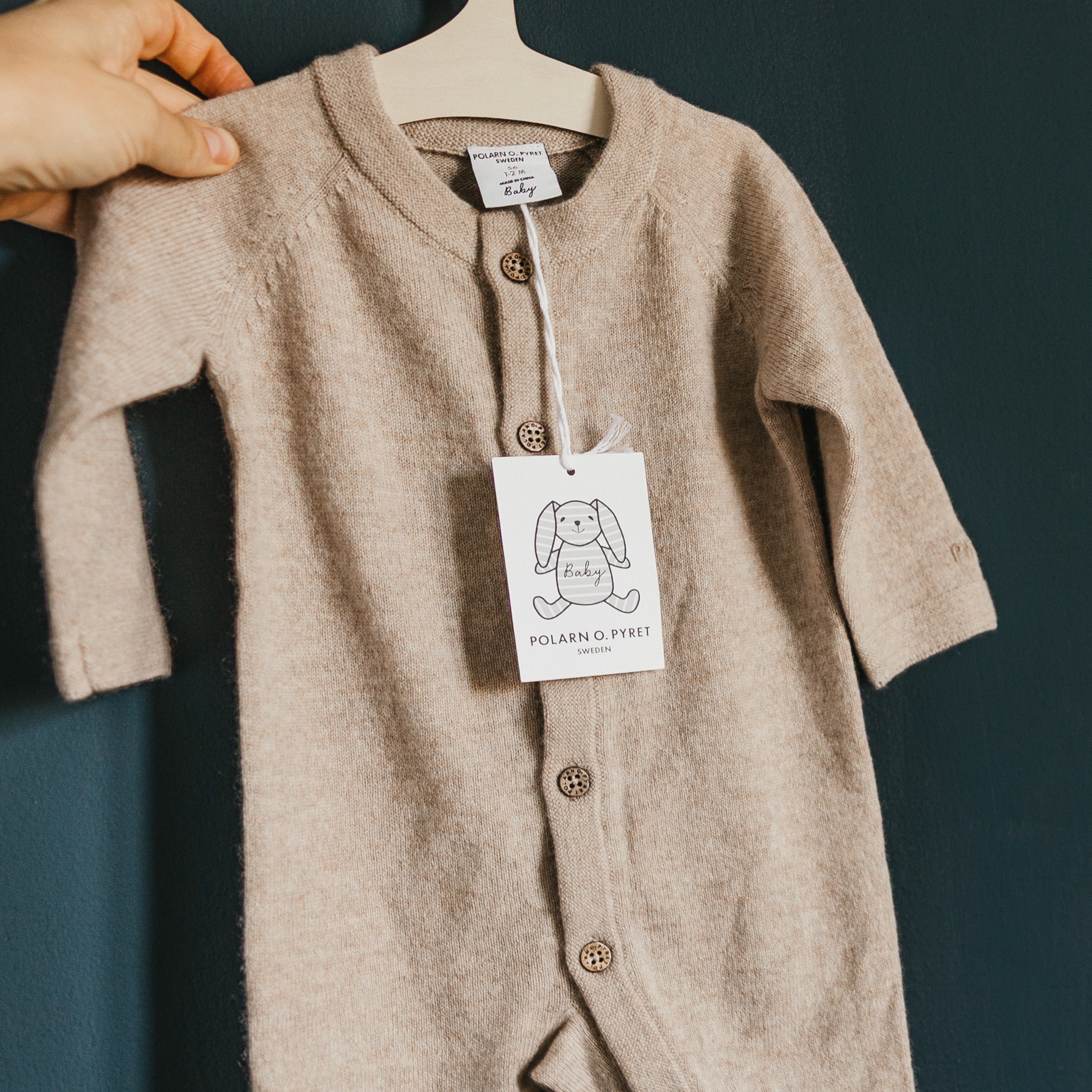 A close-up of the Polarn O. Pyret Knitted Cashmere All-in-One