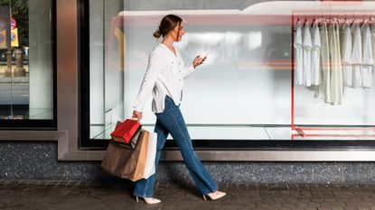 woman carrying shopping bags