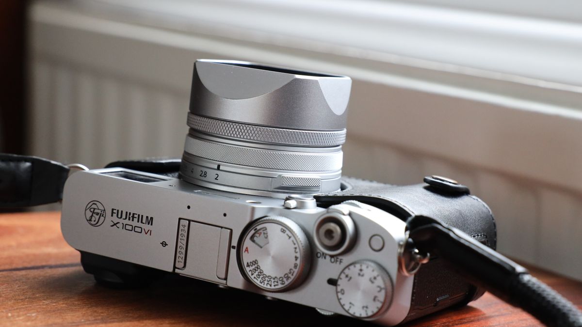 Fujifilm X100VI camera on a wooden table