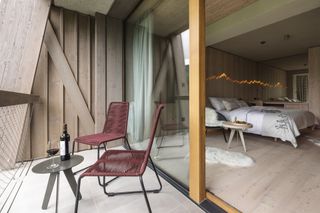 Slovenian hotel bedroom celebrates wood