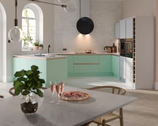 Pastel u-shaped kitchen with light and breezy, modern aesthetic
