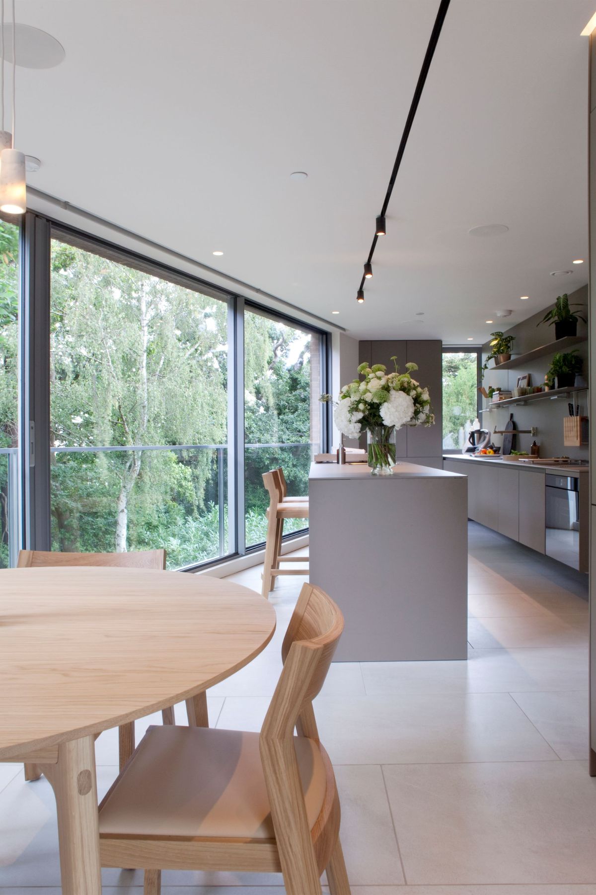 The pointy end of the triangle that is used as the kitchen space