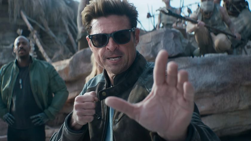 Karl Urban strikes a cool fighting pose in sunglasses in Mortal Kombat II.