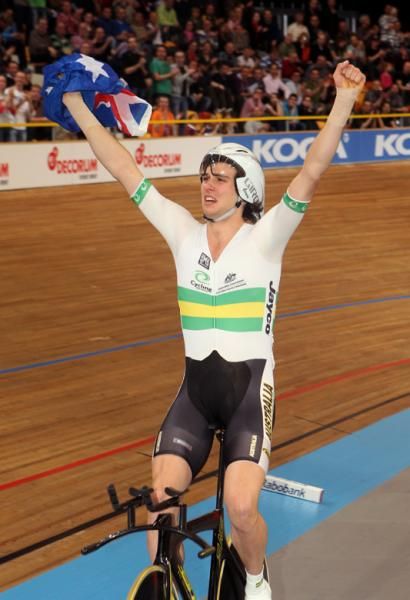 Freiberg celebrates with the Australian flag