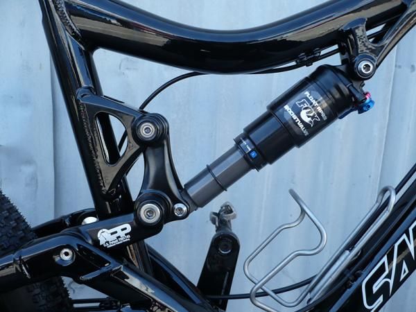 The rear suspension, featuring the APP link and Fox Float RP 23 shock.