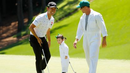 Kevin Na during the 2019 Par-3 Contest with his daughter, Sophia