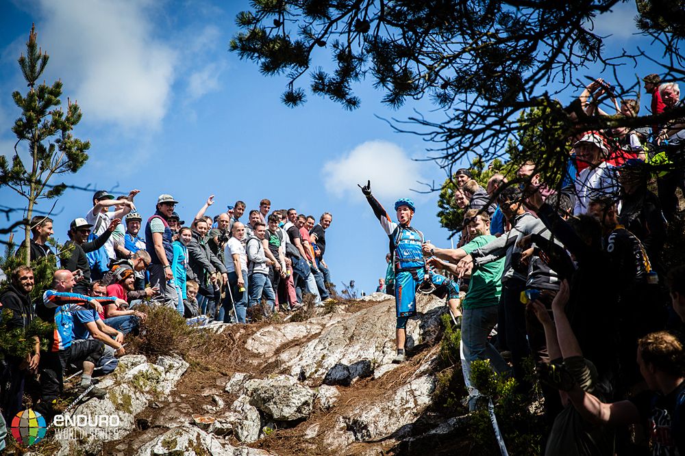 Fans cheer for the racers on course