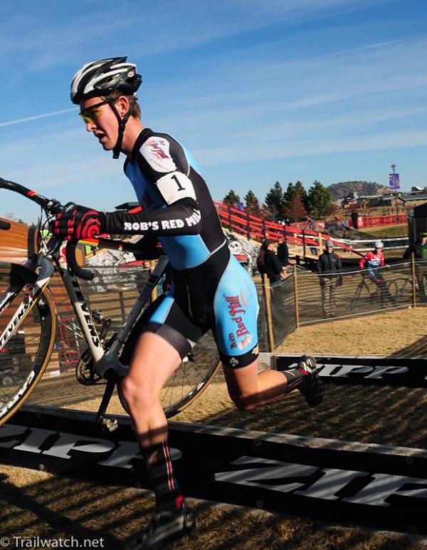 Andrew Dillman (Bob&rsquo;s Red Mill) running the barriers with the race lead