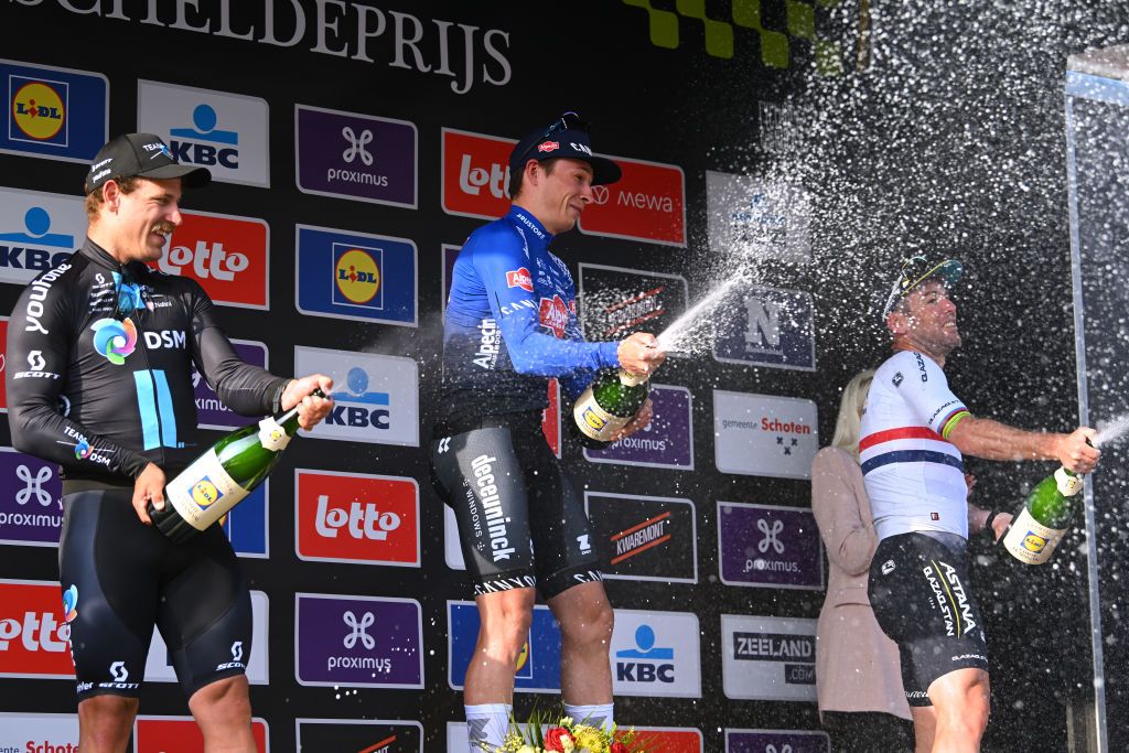 SCHOTEN BELGIUM APRIL 05 LR Sam Welsford of Australia and Team DSM on second place race winnerJasper Philipsen of Belgium and Team AlpecinDeceuninck and Mark Cavendish of The United Kingdom and Astana Qazaqstan Team on third place pose and celebrate on the podium ceremony after the 111th Scheldeprijs 2023 Mens Elite a 2053km one day race from Terneuzen to Schoten on April 05 2023 in Schoten Belgium Photo by Luc ClaessenGetty Images
