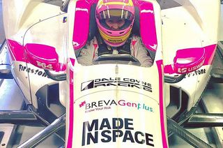 Pippa Mann in her Indianapolis 500 race car adorned with the Made In Space logo as an associate sponsor.