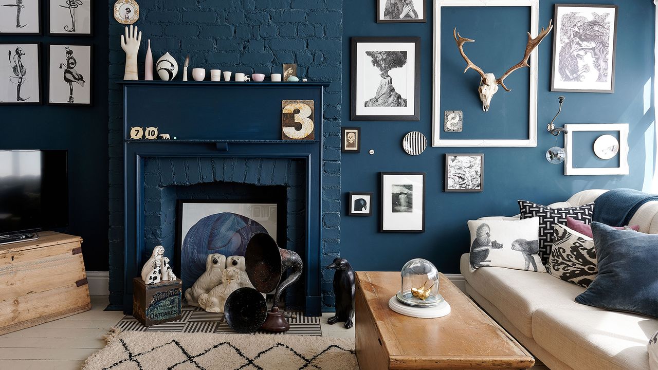 1930s semi detached house with blue painted living room and fireplace