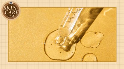 pipette squeezing oil onto a gold glittery background with smalls pools of oil on the side