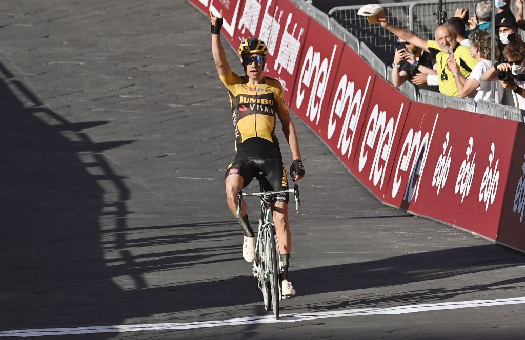 Team JumboVisma Belgian rider Wout van Aert celebrates as he crosses the finish line to win the oneday classic cycling race Strade Bianche White Roads on August 1 2020 in Siena Tuscany Photo by Marco BERTORELLO AFP Photo by MARCO BERTORELLOAFP via Getty Images