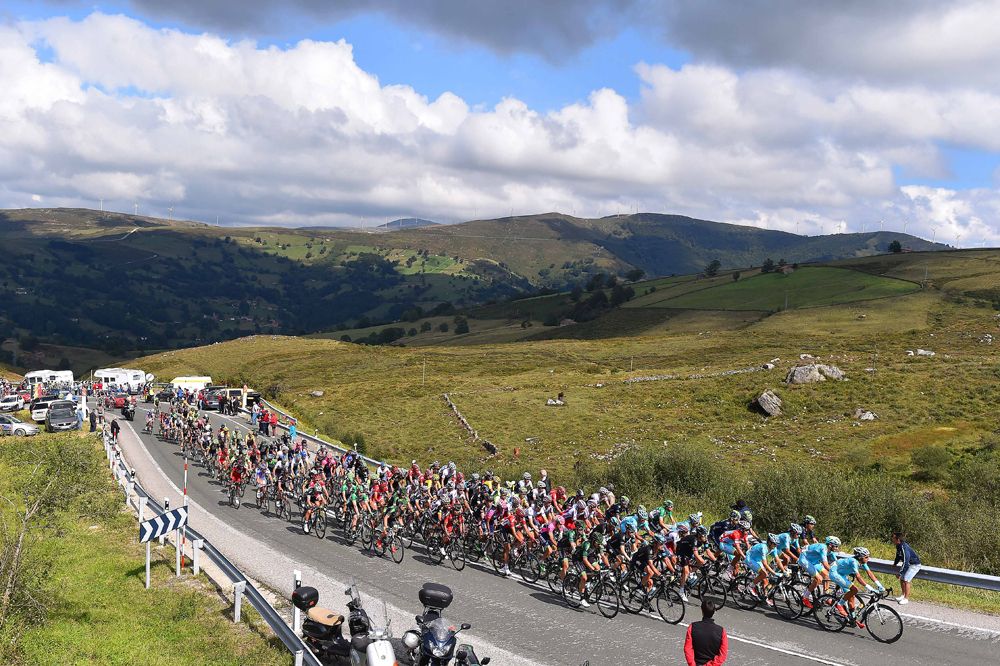 The peloton roll along during stage 14 of the Vuelta a Espana