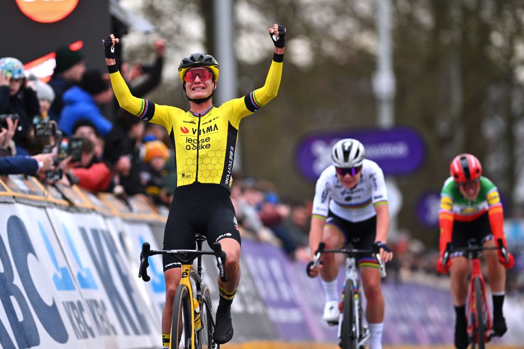 NINOVE BELGIUM FEBRUARY 24 Race winner Marianne Vos of The Netherlands and Team Visma Lease A Bike celebrates at finish line ahead of Lotte Kopecky of Belgium and Team SD WorxProtime L during the 16th Omloop Het Nieuwsblad 2024 Womens Elite a 1271km one day race from Ghent to Ninove UCIWWT on February 24 2024 in Ninove Belgium Photo by Luc ClaessenGetty Images