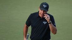 Phil Mickelson of the United States reacts after making birdie on the 13th green during the first round of the 2023 PGA Championship at Oak Hill Country Club