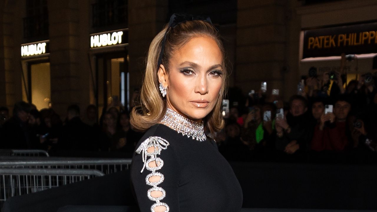 Jennifer Lopez wears a black velvet bow at fashion week