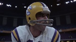 Tom Selleck in a football uniform in Superdome