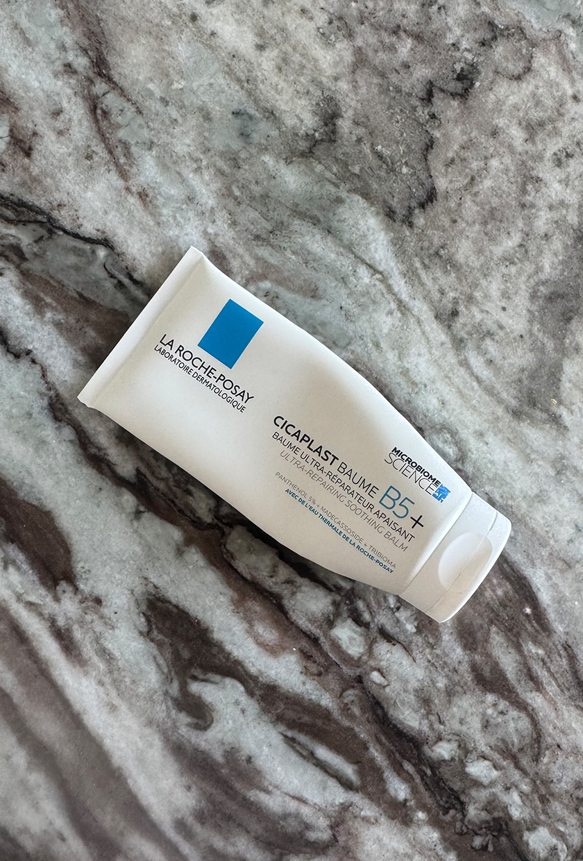 Cicaplast balm product on a marble background