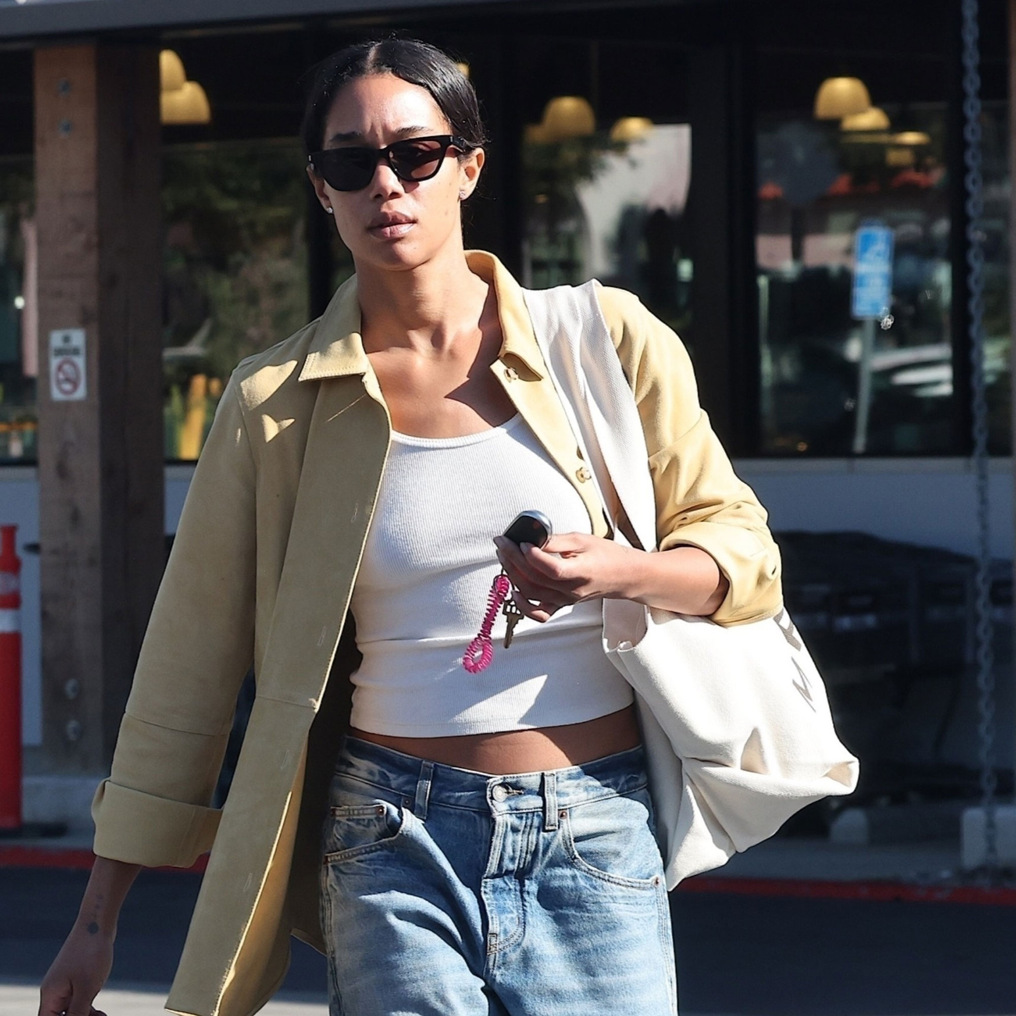 Laura Harrier Just Wore This Underrated Flat-Shoe Trend With Baggy Jeans in L.A.