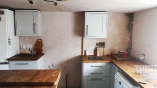 A prepared space for tiling a kitchen wall