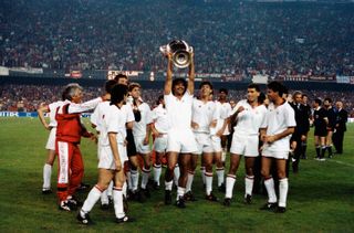 Ruud Gullit and his AC Milan team-mates celebrate victory over Barcelona in the 1994 Champions League final at the Olympic Stadium in Athens.