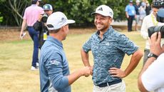  Rickie Fowler and Xander Schauffele smile as they greet each other after they both carded 62s in the first round of the 123rd U.S. Open Championship at The Los Angeles Country Club