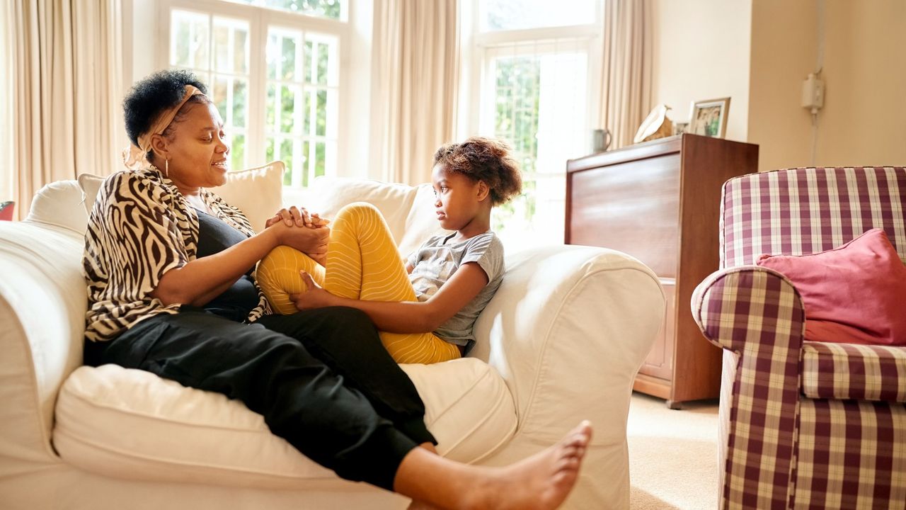 Mum talking to daughter