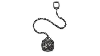 Pocket Watch Tourbillion GMT Ceramica. A pocket watch with a black segmented chain, a black face and gold number lines and hands.