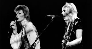 David Bowie and Mick Ronson share the vocals onstage in '73