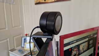 Razer Kiyo Pro Ultra review image with the webcam sitting on top of a monitor from the side