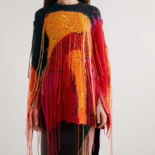 extreme knitwear with tasseled threads