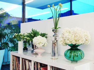 Champions Flowerbx provided buds and blooms, each placed in a range of designer vases