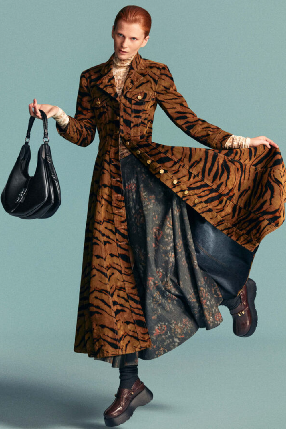 Ganni model leopard print coat and dress