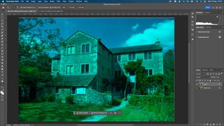 A Photoshop screenshot of a country home, with only one color channel selected