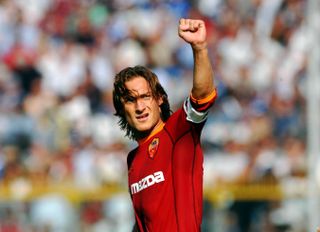 Francesco Totti celebrates after scoring for Roma against Brescia in 2002.