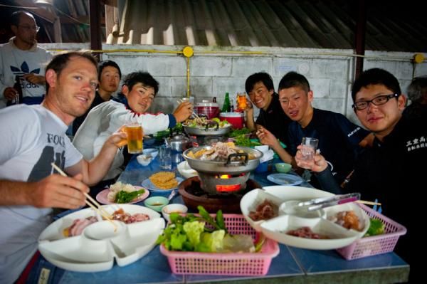 Riders enjoying a Thai barbecue in dinner
