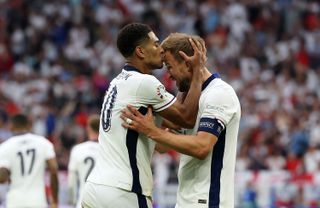 Jude Bellingham and Harry Kane celebrate the midfielder's goal against Slovakia at Euro 2024.