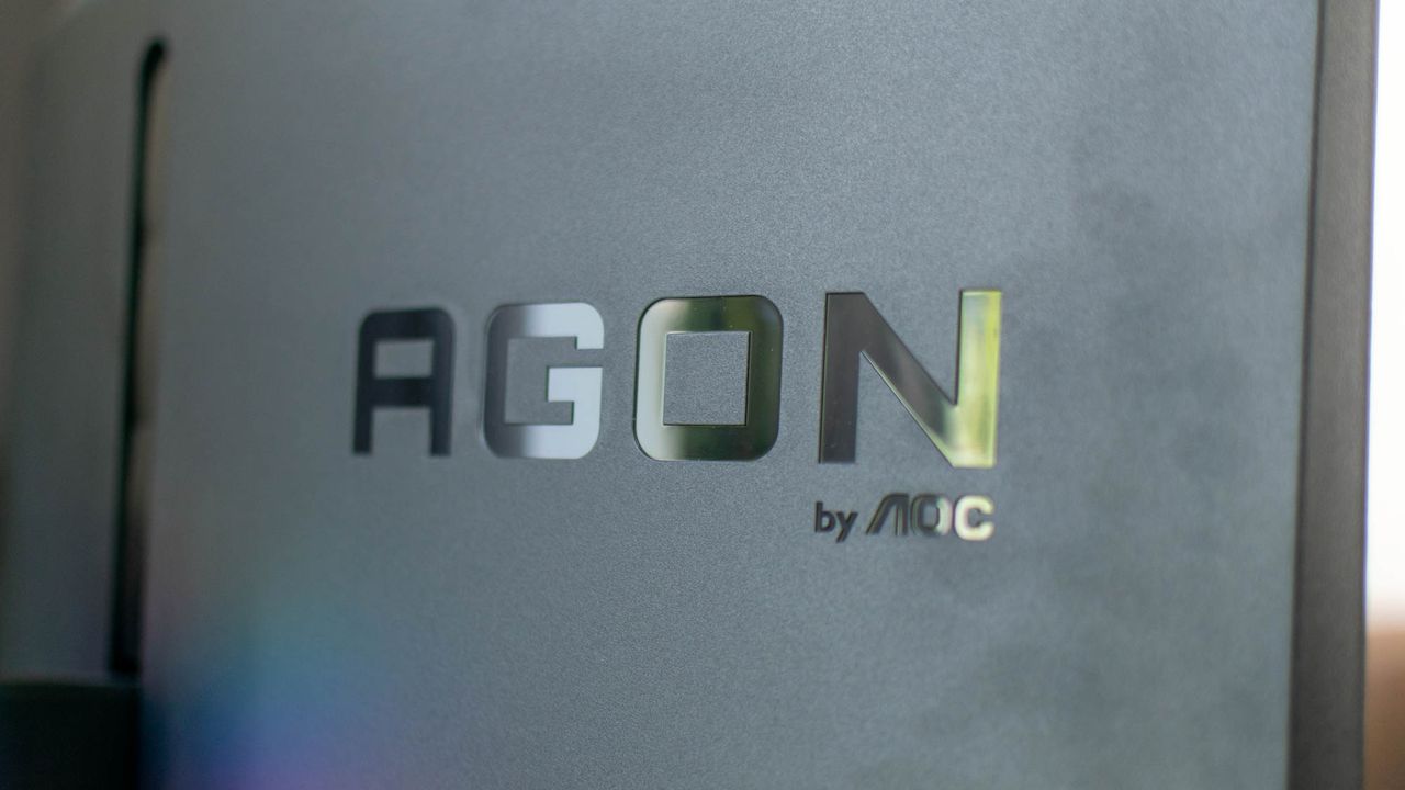 A closeup of the Porsche Design AOC Agon PD27's rear logo