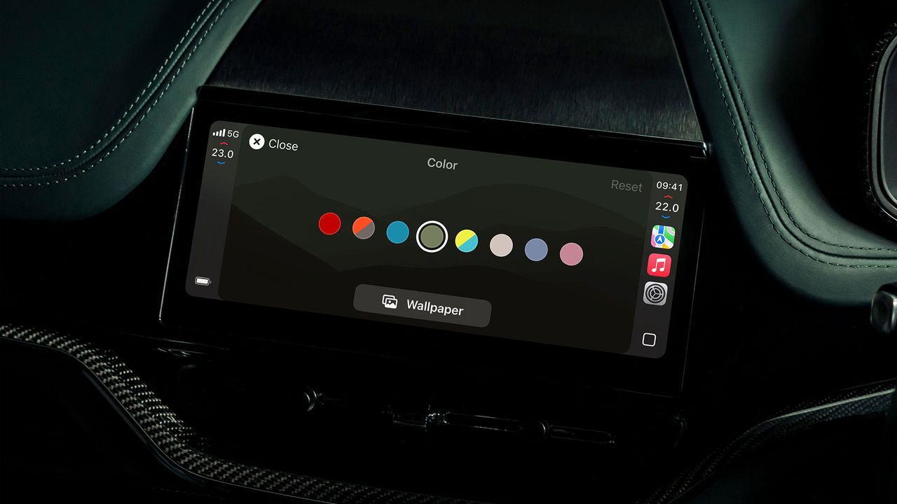 The interior of an Aston Martin car showing Apple CarPlay Ultra