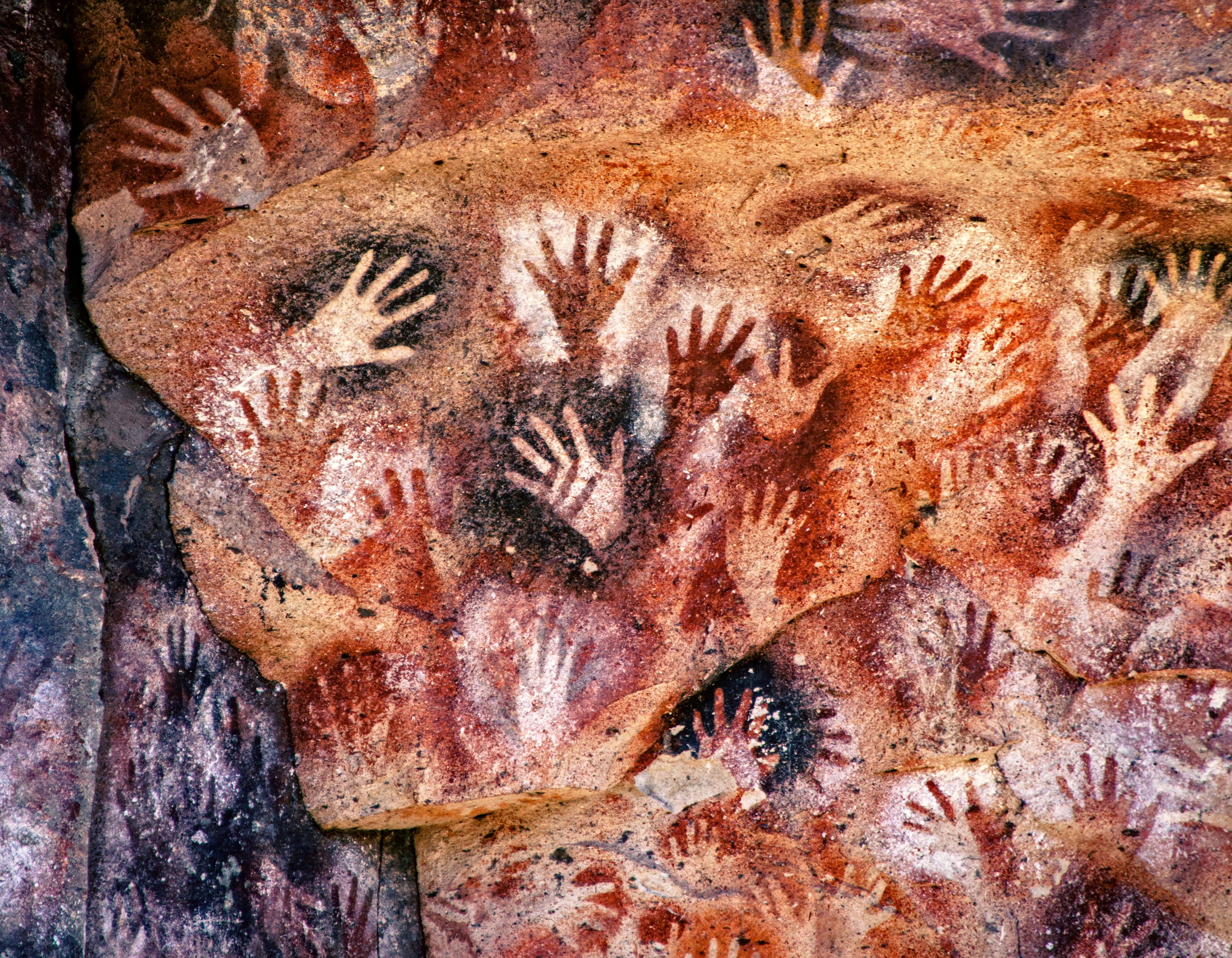 Rock art of hands on a cave wall